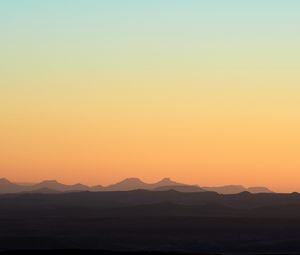 Preview wallpaper hills, mountains, sunset, sky, distance