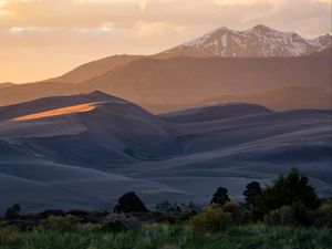 Preview wallpaper hills, mountains, trees, relief, snow