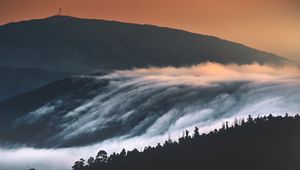 Preview wallpaper hills, mountains, trees, clouds, landscape, sunset