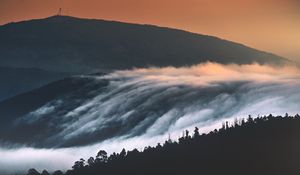 Preview wallpaper hills, mountains, trees, clouds, landscape, sunset