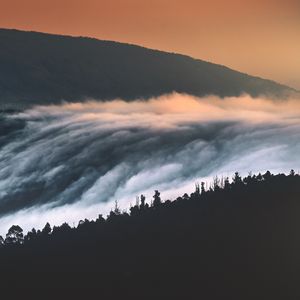 Preview wallpaper hills, mountains, trees, clouds, landscape, sunset