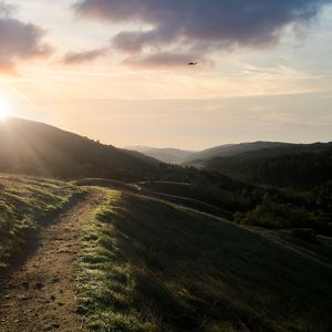 Preview wallpaper hills, path, sun, nature, landscape