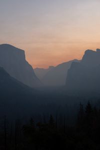 Preview wallpaper hills, peaks, fog, forest, sunset