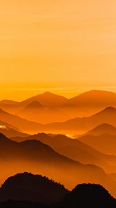 Preview wallpaper hills, relief, sunset, distance, sky