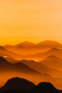 Preview wallpaper hills, relief, sunset, distance, sky