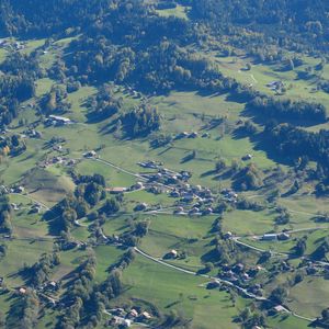 Preview wallpaper hills, relief, trees, houses, aerial view