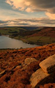 Preview wallpaper hills, river, rocks, sky, clouds, autumn