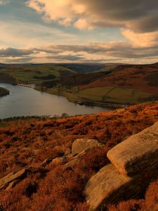 Preview wallpaper hills, river, rocks, sky, clouds, autumn