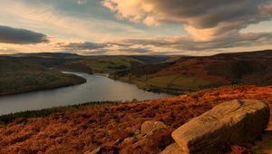 Preview wallpaper hills, river, rocks, sky, clouds, autumn