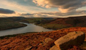 Preview wallpaper hills, river, rocks, sky, clouds, autumn