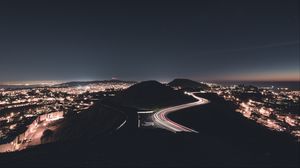 Preview wallpaper hills, road, freezelight, night, lights
