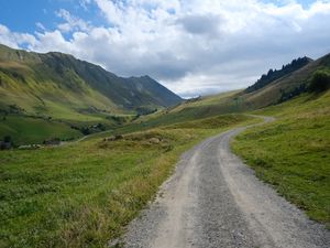 Preview wallpaper hills, road, grass, nature, landscape