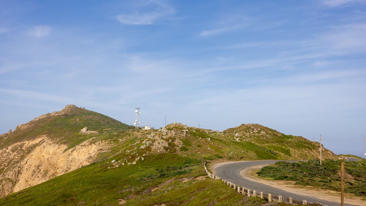 Wallpaper hills, road, turn, stones, sky hd, picture, image