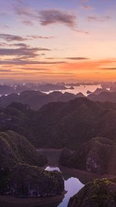 Preview wallpaper hills, rocks, river, sunset, distance