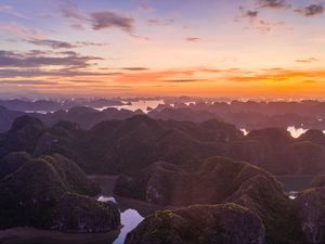 Preview wallpaper hills, rocks, river, sunset, distance