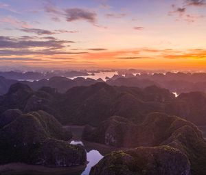 Preview wallpaper hills, rocks, river, sunset, distance