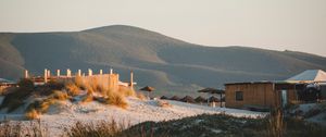 Preview wallpaper hills, sand, umbrellas, beach, nature