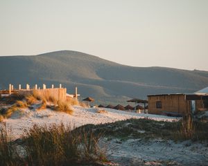 Preview wallpaper hills, sand, umbrellas, beach, nature