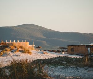 Preview wallpaper hills, sand, umbrellas, beach, nature