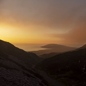 Preview wallpaper hills, sea, road, twilight