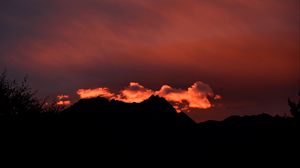 Preview wallpaper hills, silhouettes, clouds, sky, evening