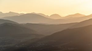 Preview wallpaper hills, silhouettes, fog, nature