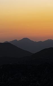 Preview wallpaper hills, silhouettes, mountains, sunrise, landscape