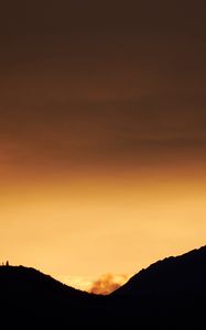 Preview wallpaper hills, silhouettes, sunset, sky, dusk, evening