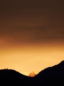Preview wallpaper hills, silhouettes, sunset, sky, dusk, evening