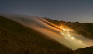 Preview wallpaper hills, slope, lights, fog, evening