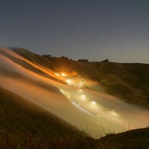 Preview wallpaper hills, slope, lights, fog, evening