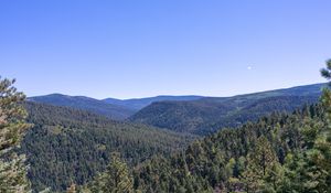 Preview wallpaper hills, slopes, trees, forest, green, sky, nature