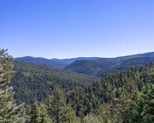 Preview wallpaper hills, slopes, trees, forest, green, sky, nature