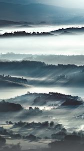 Preview wallpaper hills, slopes, trees, fog, nature