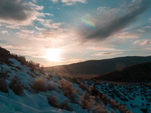 Preview wallpaper hills, snow, sunset, winter, landscape