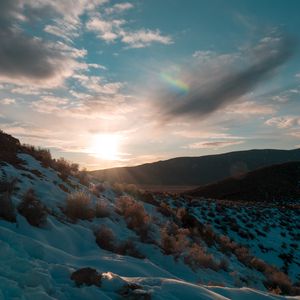 Preview wallpaper hills, snow, sunset, winter, landscape