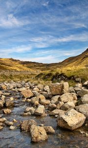 Preview wallpaper hills, stones, river, landscape, nature