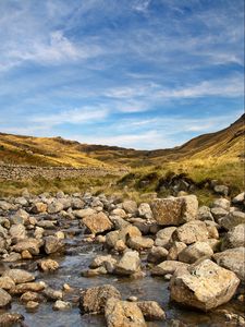 Preview wallpaper hills, stones, river, landscape, nature