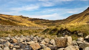 Preview wallpaper hills, stones, river, landscape, nature