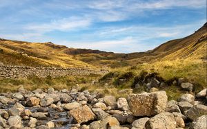 Preview wallpaper hills, stones, river, landscape, nature