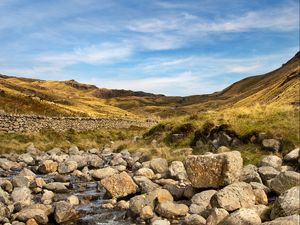 Preview wallpaper hills, stones, river, landscape, nature