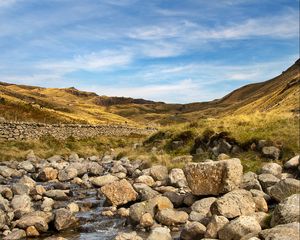 Preview wallpaper hills, stones, river, landscape, nature