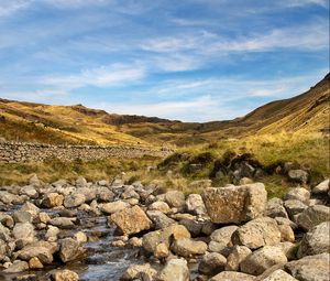 Preview wallpaper hills, stones, river, landscape, nature