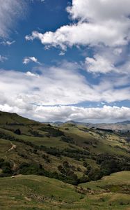 Preview wallpaper hills, trees, clouds, landscape, nature