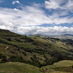 Preview wallpaper hills, trees, clouds, landscape, nature