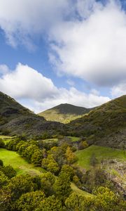 Preview wallpaper hills, trees, clouds, landscape