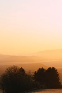 Preview wallpaper hills, trees, fog, dusk, morning, landscape