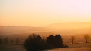 Preview wallpaper hills, trees, fog, dusk, morning, landscape