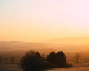 Preview wallpaper hills, trees, fog, dusk, morning, landscape