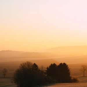 Preview wallpaper hills, trees, fog, dusk, morning, landscape